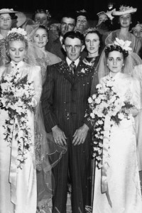 http://commons.wikimedia.org/wiki/File:StateLibQld_1_106704_Family_and_friends_gather_at_this_double_wedding_in_1939.jpg