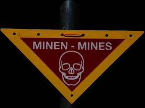 http://commons.wikimedia.org/wiki/File:Mines_warning_sign.jpg