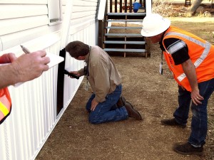 http://commons.wikimedia.org/wiki/File:FEMA_-_33788_-_County_building_inspector_at_a_FEMA_supplied_mobile_home_in_California.jpg