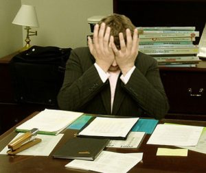 https://commons.wikimedia.org/wiki/File:Frustrated_man_at_a_desk_(cropped).jpg