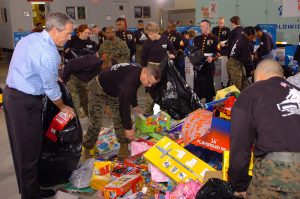 https://commons.wikimedia.org/wiki/File:US_Navy_051219-N-0733J-002_U.S._President_George_Bush_lends_a_hand_in_this_year's_Toys_for_Tots_campaign_by_loading_up_sacks_of_gifts_at_the_Marine_Corps_Reserve_Center.jpg