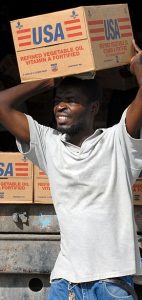 https://commons.wikimedia.org/wiki/File:US_Navy_080916-N-3595W-055_A_Port-au-Prince_citizen_carries_supplies_to_be_delivered_to_communities_affected_by_Hurricane_Ike.jpg