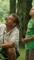 http://commons.wikimedia.org/wiki/File:Father_and_son_enjoy_a_leisurely_afternoon_of_birdwatching.jpg